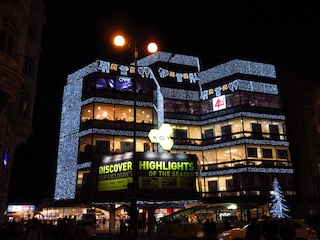 Hexagonal brutalist illuminated building