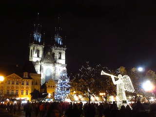 Old town square with church and angel