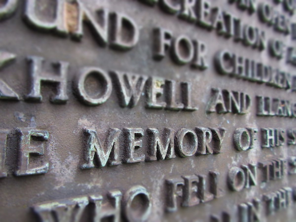 The word Memory in focus on a plaque