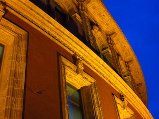 Abert Hall at dusk, window has the word Victoria on it