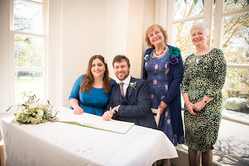 Victoria and Andrew with our mums at the register