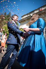 Andrew and Victoria surrounded by confetti