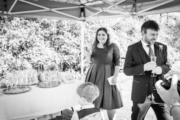 Victoria and Andrew drinking the champagne that they have now