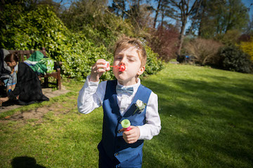 Best man blowing bubbles