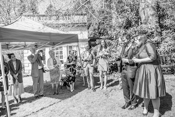 Speech with parents and friends looking on