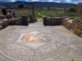 Mosaic of Dionysus and Ariadne with mountains in the background